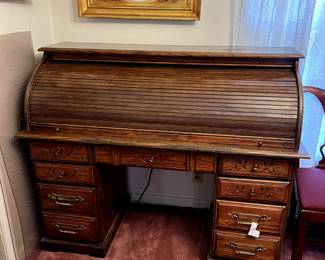 #2	Roll top desk with 7 drawers and cubbies 54x24x46 as is finish	 $100.00 			

