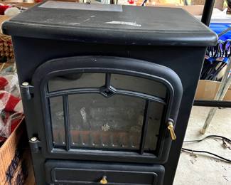#286 bp small electric fireplace heater 15x10x21 $25.00