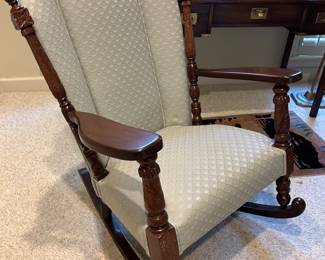 Lot #81 - $150 Upholstered Rocking chair with carved posts. 29" x 34" x 39"H