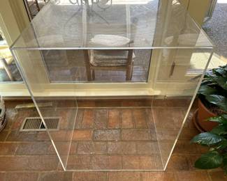 Lot #219 -$125  Lucite stand - 5 sides, bottom is open. 24"x20-1/2" x 23"H