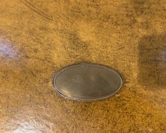 Lot #84 - center of leather top, brass plate