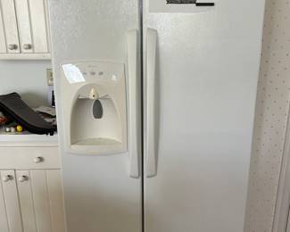 Lot #236 -$150  Amana side by side refrigerator/freezer