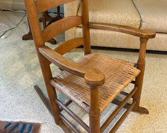 Lot #85 - $295 Antique ladder back rocking chair - 30"H x 20-1/2"W