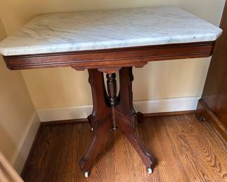 Lot #48 -$225 Marble top Eastlake table. 29-1/2"H x 28"W x 20"D 