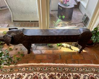 Lot #54 - $135 LONG welded metal pig table. 57"L x 18"H x 13"W at the ears