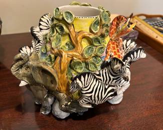 Lot #83 - $125 smaller Intu-Art 3-D African animal vase. 7-1/2"H x 9-1/2"W. One zebra has been repaired