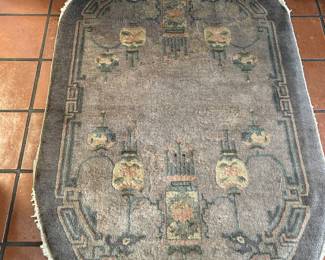 Lot #215 - $80 oval grey rug 1 of 2
