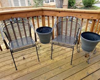 Two matching chairs $30 each. Plastic planters with stands $15 ea.
