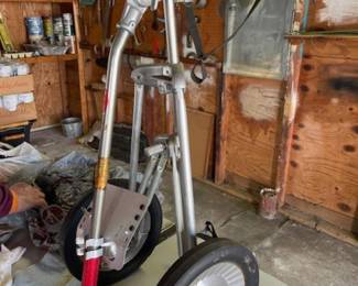 Vintage golf pull cart.  Also available, vintage clubs