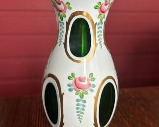 $38 ~ CZECH MOSER CASED WHITE CUT TO GREEN HAND PAINTED VASE, EUC. Approximate measurements are 8" x 3.5". (To purchase or inquire about this item, please text 470.370.0348.)