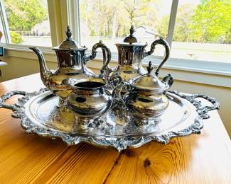 $225 ~ ROYAL ENGLISH COFFEE/TEA SET BY WALLACE, INCLUDES FOOTED TRAY, COFFEE, TEA, CREAM & SUGAR. SILVERPLATE. 25 YEARS OLD, NEVER USED. Footed tray measures approximately 25" x 16" x 2.25". Coffee is 9" high. Tea is 8.5" high. (To inquire about or to purchase this item, please text 470.370.0348.)