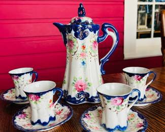 $40 ~BLUE FLORAL VICTORIAN COFFEE CHOCOLATE TEAPOT & 4 CUPS/SAUCERS. No markings. One cup has crack on interior as pictured.   (To purchase or inquire about this item, please text 470.370.0348.)