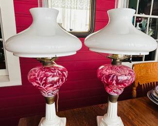 $425 ~ STUNNING PAIR FENTON OIL LAMPS, ELECTRIFIED. Each measure approximately 25"h x 12" w.  (To purchase or inquire about this item, please text 470.370.0348.)