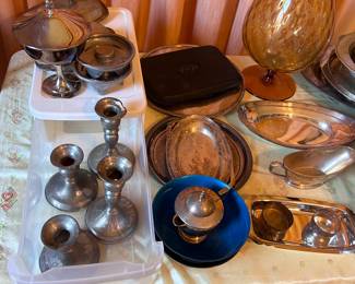 Silver candlesticks, plates, serving pieces