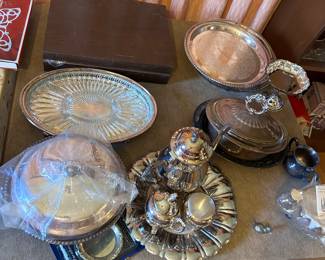Silver candlesticks, plates, serving pieces