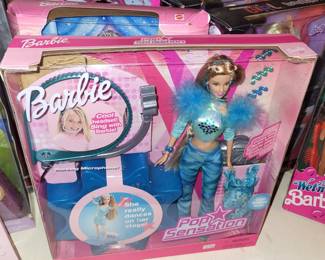 Barbies still in original packaging 