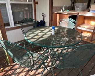 4 foot metal table and chairs
