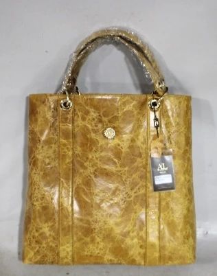 7055 - Lazzaro ladies leather purse, new 16 x 15.5
