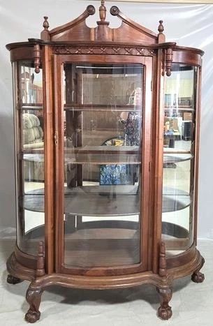 1158 - Triple curved glass china cabinet, claw feet mirror back, wood shelves with key small 3 " crack in corner of one of mirrors 78 x 58 x 12
