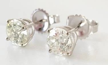 7z - 2 Carat diamond stud earrings APP $12,225 2 - .98 Carat round brilliant cut diamonds, 14K white gold
8w - Sterling Silver Garnet Ring, size 7
