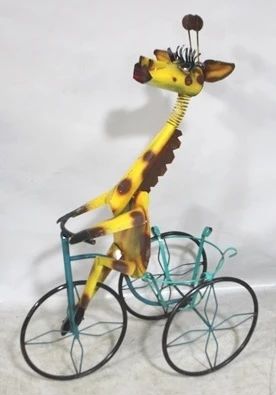 7863 - Metal giraffe trike planter, 42 x 25 x 14
