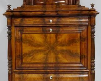 3911 - Stunning 19th Century Secretaire Abbatant signed by maker Theo Warnoke bookmatched mahogany, intricate carvings, inlaid escutcheons, drop lid contained beautiful pigeon drawers with pull out leather writing surface, hiddine drawers, hand champhored back, with key 85 x 45 x 25
