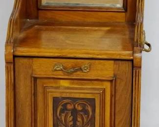 3895 - English carved stand w/ coal hod base beveled mirror with gallery, casters 40 x 15 x 14
