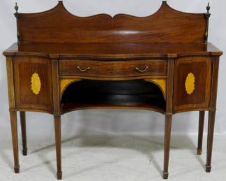 3925 - Federal inlaid mahogany sideboard unusual finial adorned backsplash, contrasting inlay, tapered legs, open shelf under bowed drawer 49 x 60 x 20
