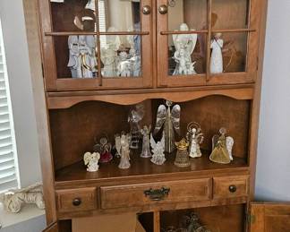 Beautiful hutch. All the figurines are for sale!