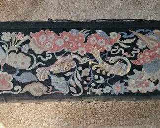 Needlepoint cushioned bench.