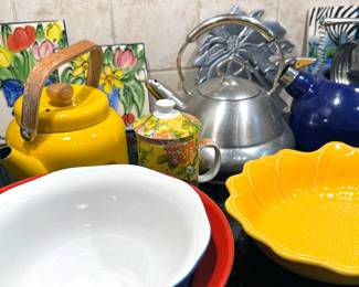 Colorful ceramic kitchen bowls and plates