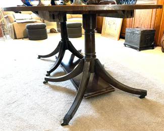 Antique table with cascading legs