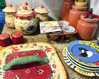 Colorful ceramic kitchen bowls and plates