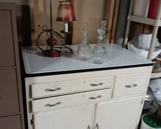 Wood cabinet with enamel top