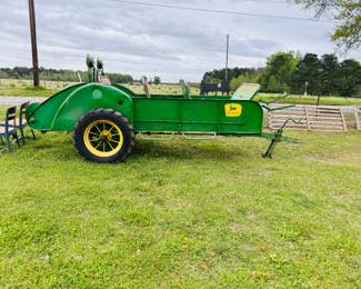 1930’s John Deere manure spreader converted to a wagon with seats!  Great for a parade ! 