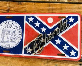 Chevrolet emblem mounted onto a State of Ga flag Lic plate