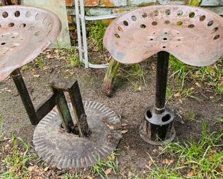 Vintage metal tractor seats made into stools