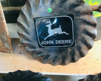 John Deere emblem on old disc harrow blade
