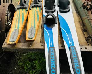 Skis. Taperflex wooden training ski and O’Brien skis made by Coleman
