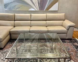 Natuzzi Leather Sectional Sofa and glass topped coffee table