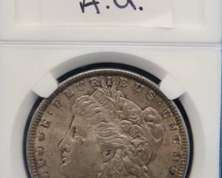 Lot 332. 1885 P Morgan silver dollar.  A.U.