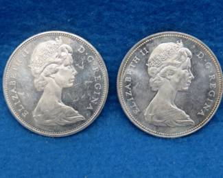 Lot 127. Two 1965 Canadian silver dollars