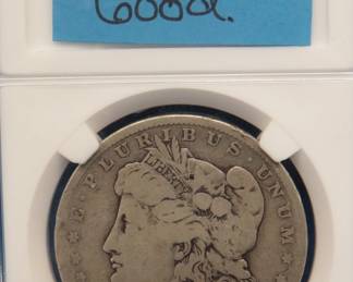 Lot 290. 1884 O Morgan silver dollar.  Good condition.