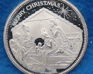 Lot 178. Merry Christmas silver coin.  One ounce of .999 fine silver.