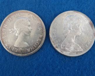 Lot 244. 1963 and a 1966 Canadian silver dollars