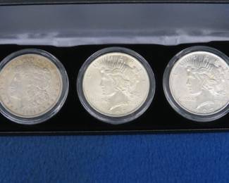 Lot 239. 1921 P Morgan and 1922 P and 1923 P Peace Silver Dollars