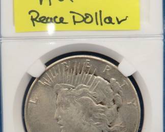 Lot 162. 1935 P Peace silver dollar.  AU