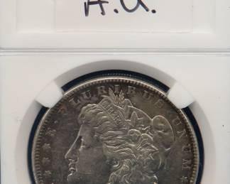 Lot 331. 1884 P Morgan silver dollar.  A.U.