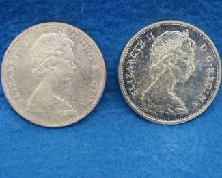 Lot 106. Two Canadian silver dollars.  80% silver.