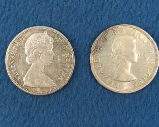 Lot 136. Two 80% silver Canadian dollars